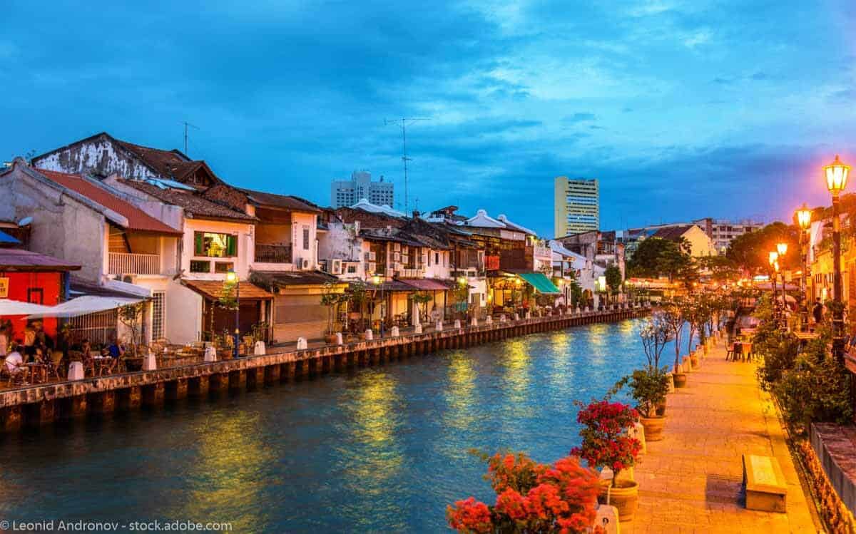 a photo of Melaka's riverwalk at night