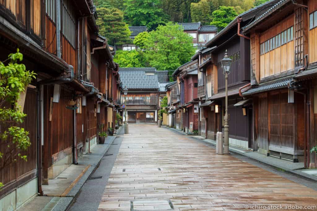 a street with traditional wooden buildings in the Higashi Chaya District in Kanazawa
