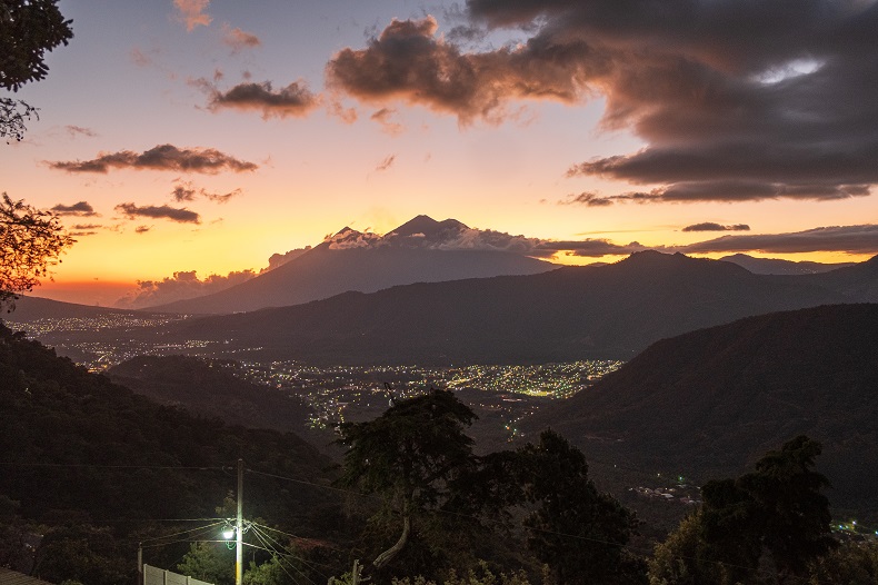 El Fuego and Acatenango and the city of Antigua at sunset