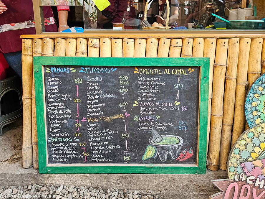 a menu of Oaxaca street food at La Cosecha Market