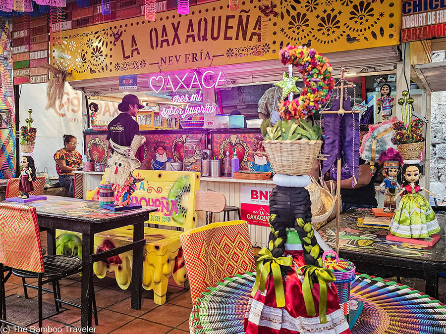 a nieveria shop in Oaxaca with colorful chairs and tables