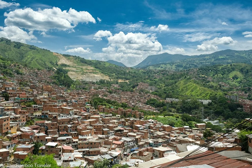 red brick homes on the slope of a mountain