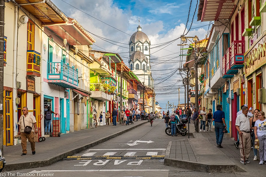 a street lined with colorful buildings in Filandia, Colombia